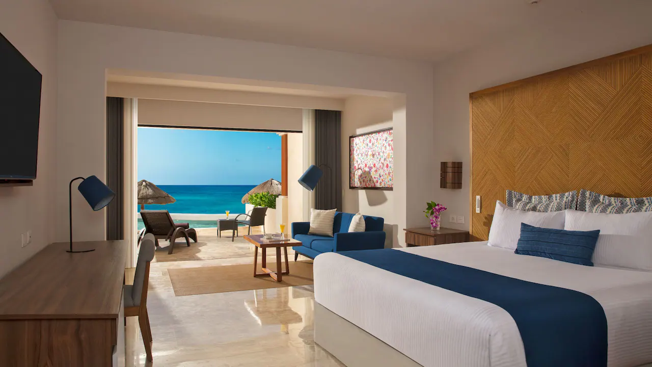  Preferred Club Junior Suite Beach Front Swim Out King at Dreams Sapphire Resort & Spa