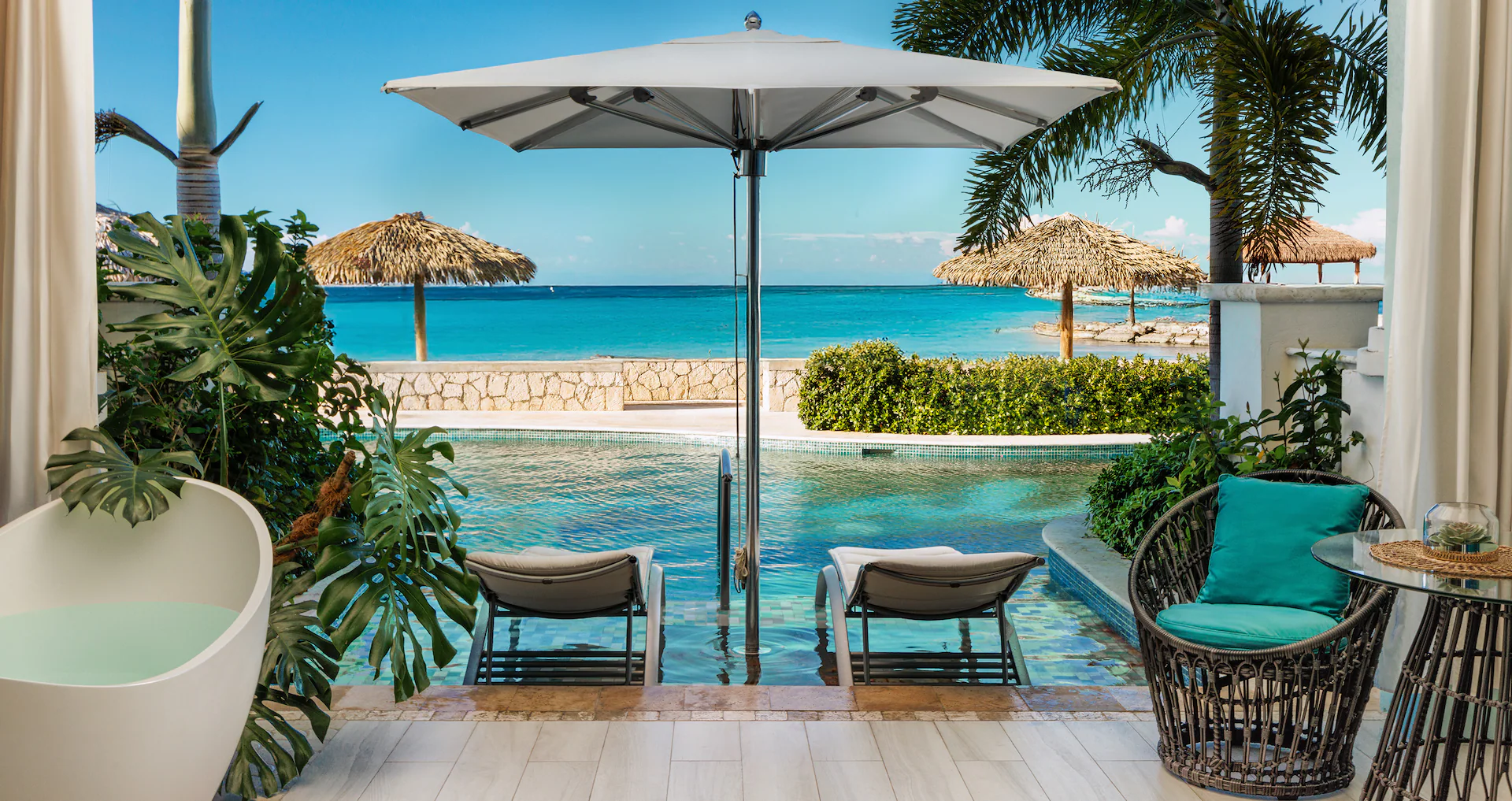 Beachfront Swim-up Millionaire One-Bedroom Butler Suite w/ Patio Tranquility Soaking Tub